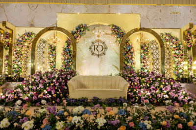 Designer flower decorations for reception stage backdrop
